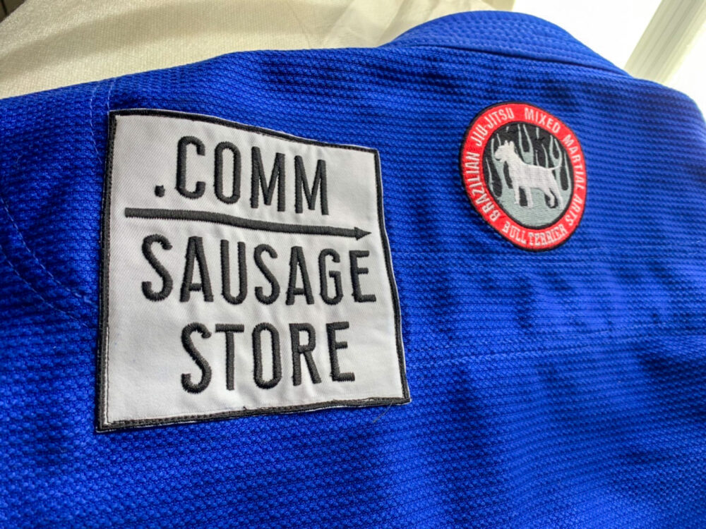 .comm SAUSAGE STORE wappen